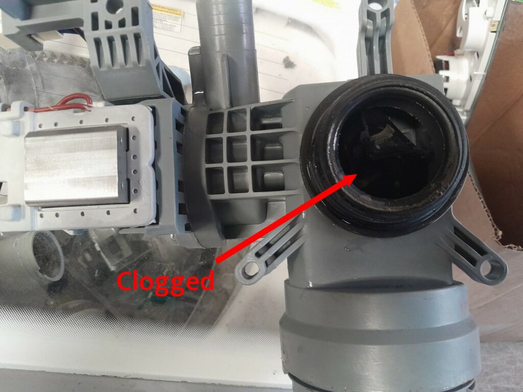 Washer Drain Pump Clogged with a Face Mask