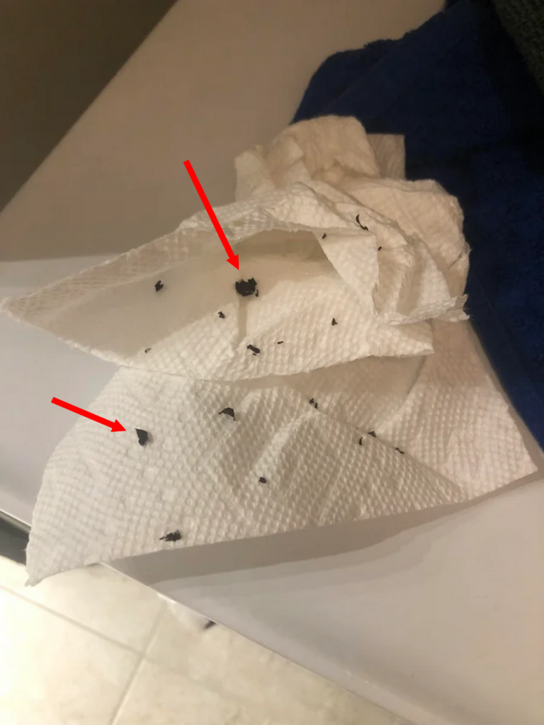Black Flakes on Paper Towel Test