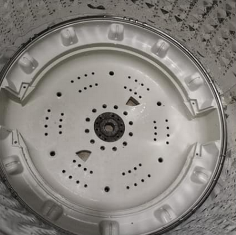 Black stuff in washing machine