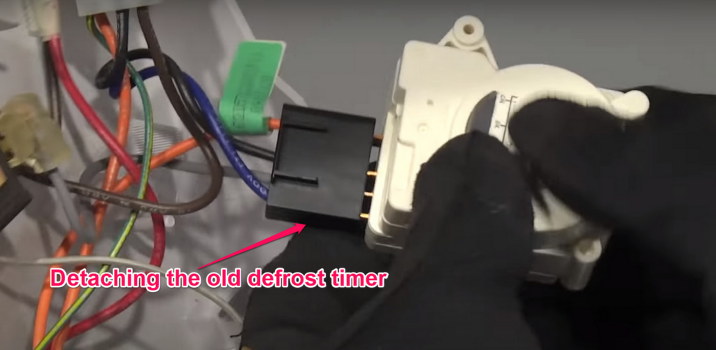 Refrigerator Detaching the Old Defrost Timer