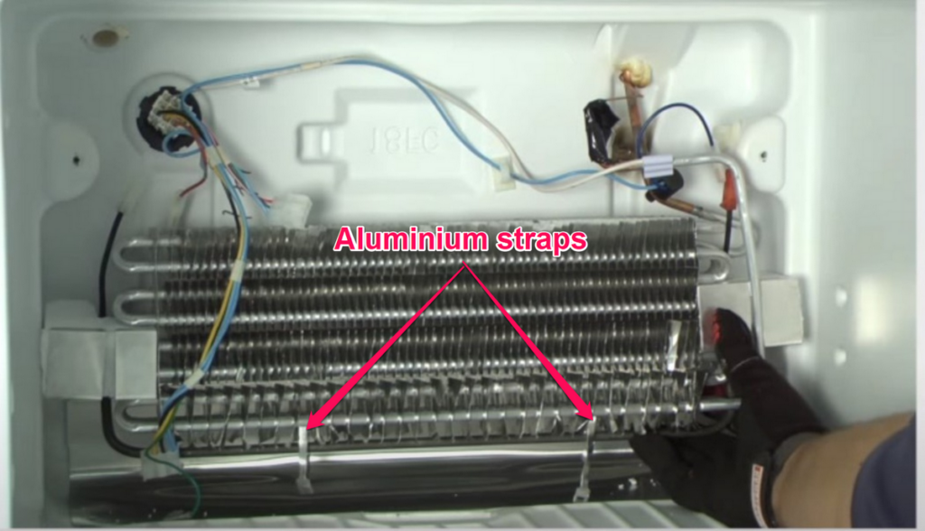Replacing the Defrost Heater Fridge Step 2 Remove Aluminium Straps