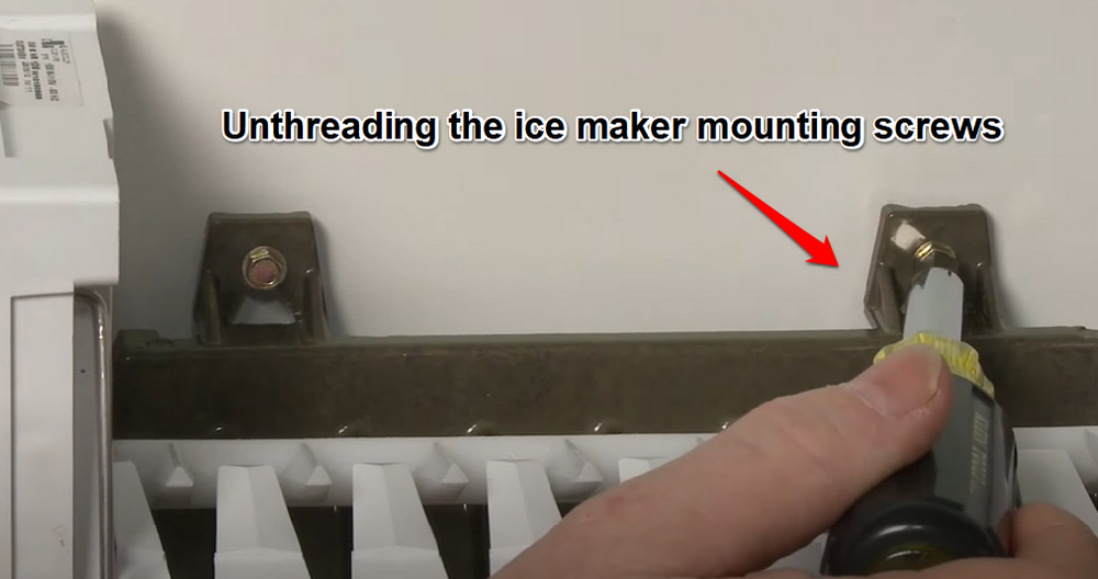 Unthreading the Ice Maker Mounting Screws