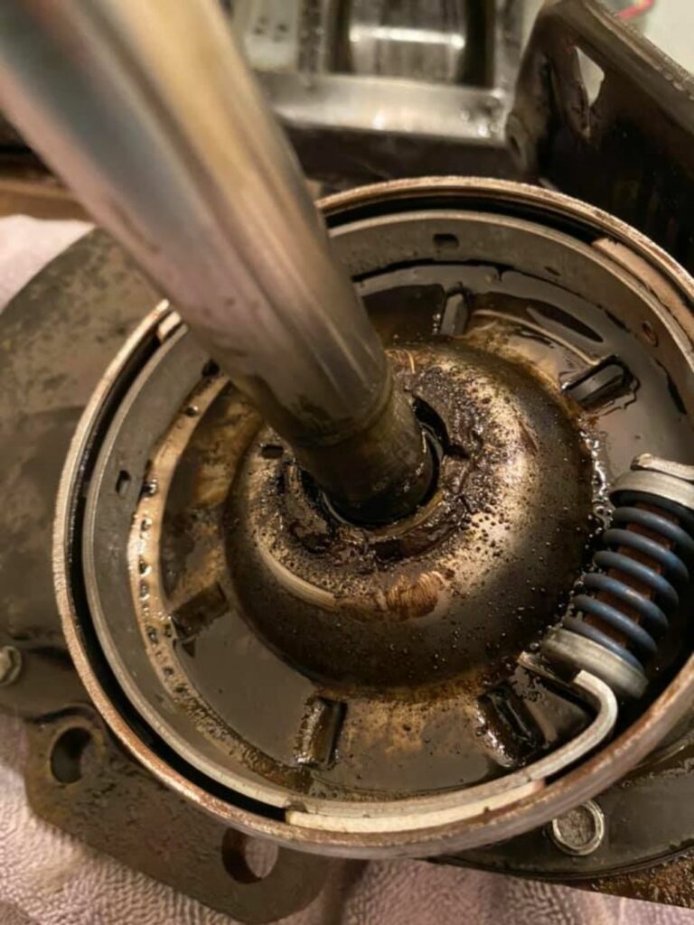 Clutch covered by oil leaking from the transmission